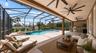 Large lanai, screened saltwater pool, & outdoor kitchen! (virtually staged)
