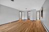 Hardwood flooring, light gray wall finishes, built-in closet , en-suite