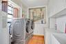Laundry located right off of the kitchen. Washer and dryer convey.