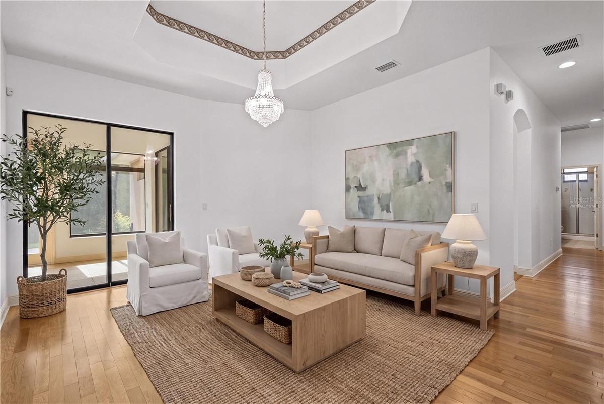 Architectural details add character while maintaining a warm and welcoming atmosphere. - virtually staged