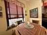 Eat in kitchen area, with large window in the corner of the building, great for ventilation