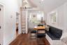 Cottage Dining Area with View of Loft and Kitchen