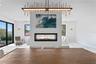 see through fireplace standing in the dining room