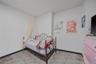 Bedroom featuring baseboards