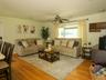 You instantly feel right at home in this adjoining Living room, conveniently located where family and friends gather.