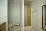 Toilet area and Stall Shower