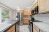 Kitchen with Access to Laundry Room and Full Bath