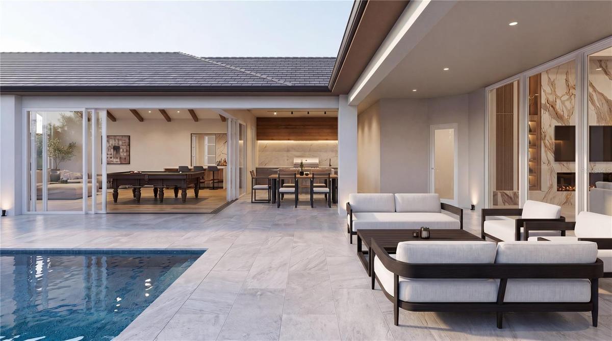Huge Travertine deck and covered lanai for seamless daytime to evening entertaining
