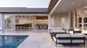 Huge Travertine deck and covered lanai for seamless daytime to evening entertaining