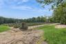 View of yard with a rural view