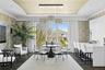 Dining room with a raised ceiling