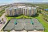 Tennis courts, numerous pools, and fitness rooms