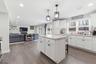 Kitchen opens to Family Room