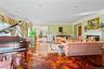 Formal living space featuring parquet wood-finish flooring