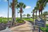Just steps away, private beach access invites you to begin and end your days along the Atlantic shoreline.