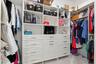 The primary bedroom offers "his and hers" walk-in closets.