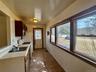 6 - Kitchen featuring gas range gas stove, visible vents, light countertops, and a sink