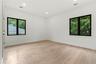 Bright interior space featuring light wood-finish flooring