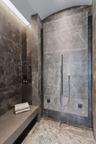 Full bathroom with a tile shower