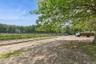 View of street with a view of rural / pastoral area and a view of trees