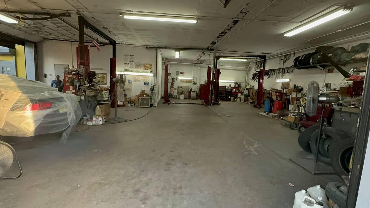Garage featuring a workshop area