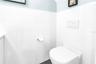 First Floor Powder Room, wall mount toilet. Super easy cleaning.