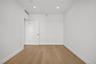 Spare room featuring light wood finished floors and recessed lighting