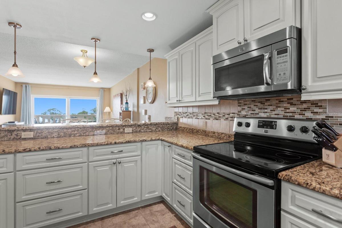 Kitchen w/ceramic tile flooring.