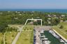 Duryrea's Restaurant and Marina shown across the street as well as the entrance to Orient Beach State Park.