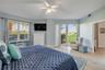 Primary suite with sliders to the patio