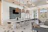 Resort style community clubhouse with a community pool, fitness center and lake front pool.