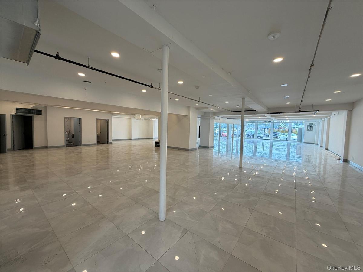Miscellaneous room featuring recessed lighting and elevator
