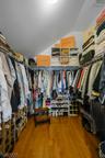 1 of 2 Primary Walk-in Closets