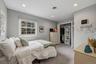 This bedrooms offers a unique closet system.