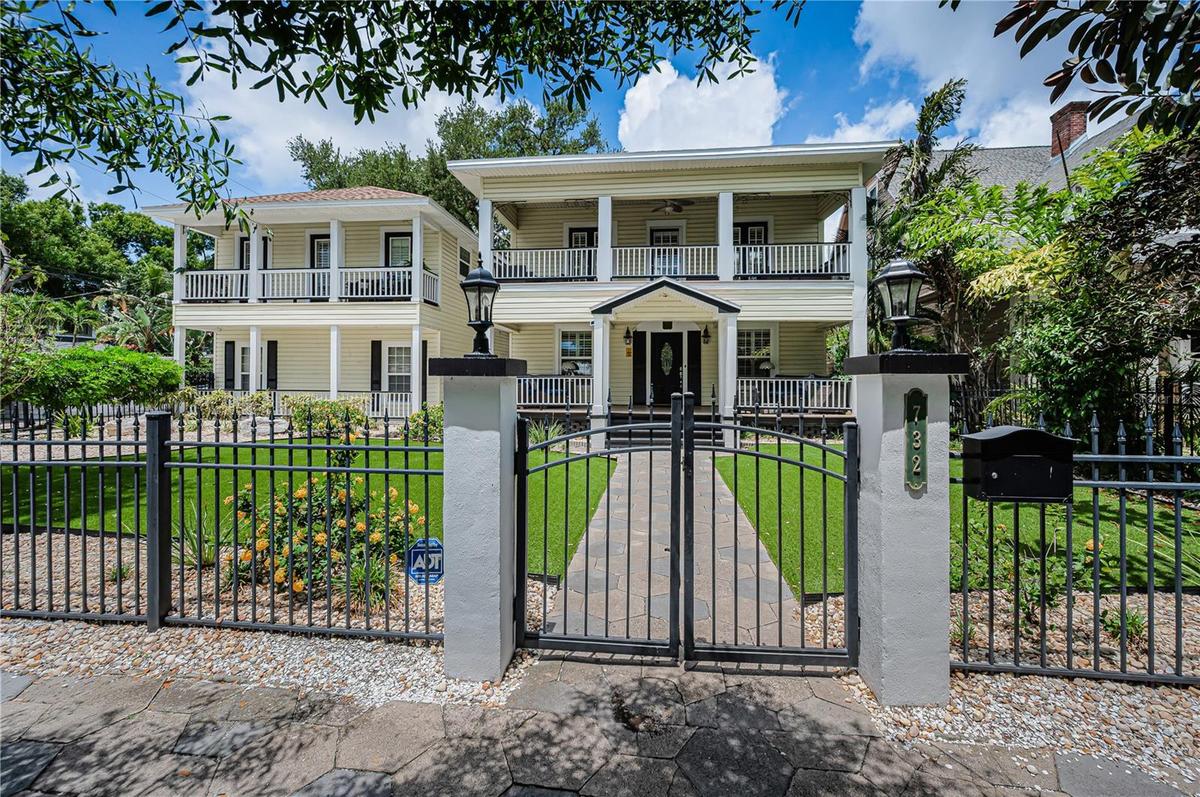 Wrought Iron fence surrounding the front lawn.