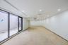 Unfurnished room with concrete floors and recessed lighting