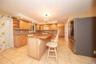 stainless steel appliances. Center island with granite. Spacious and roomy Kitchen with lots of storage.