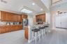 Well-proportioned kitchen with ample workspace and storage, thoughtfully integrated into the main living areas.