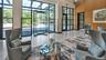 Sunlit glass windows and doors welcome residents and guest, complemented by attentive Concierge and doorman services