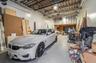 Garage featuring an AC wall unit