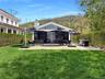 Sunny patio with outdoor kitchen