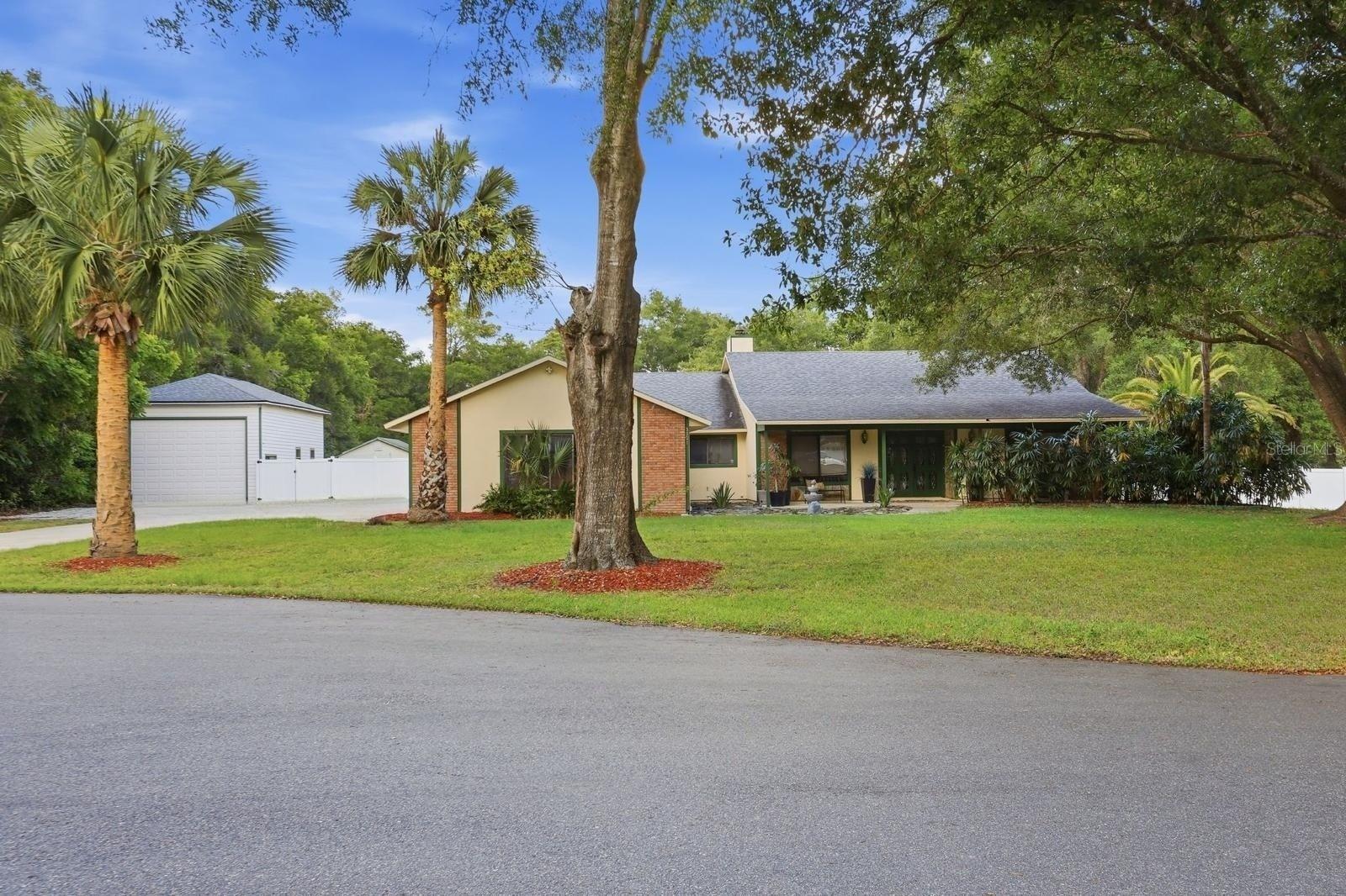 Beautiful 2.5 Acre Estate Surrounded by mature Trees