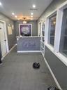 Reception area featuring a built-in counter, recessed ceiling lighting, and a ceiling fan