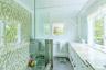 Bathroom with vanity, plenty of natural light, and a shower stall