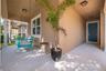 Charming curb appeal, porch swing pond and preserve views and no front neighbors