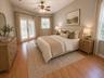 Virtually staged master bedroom suite