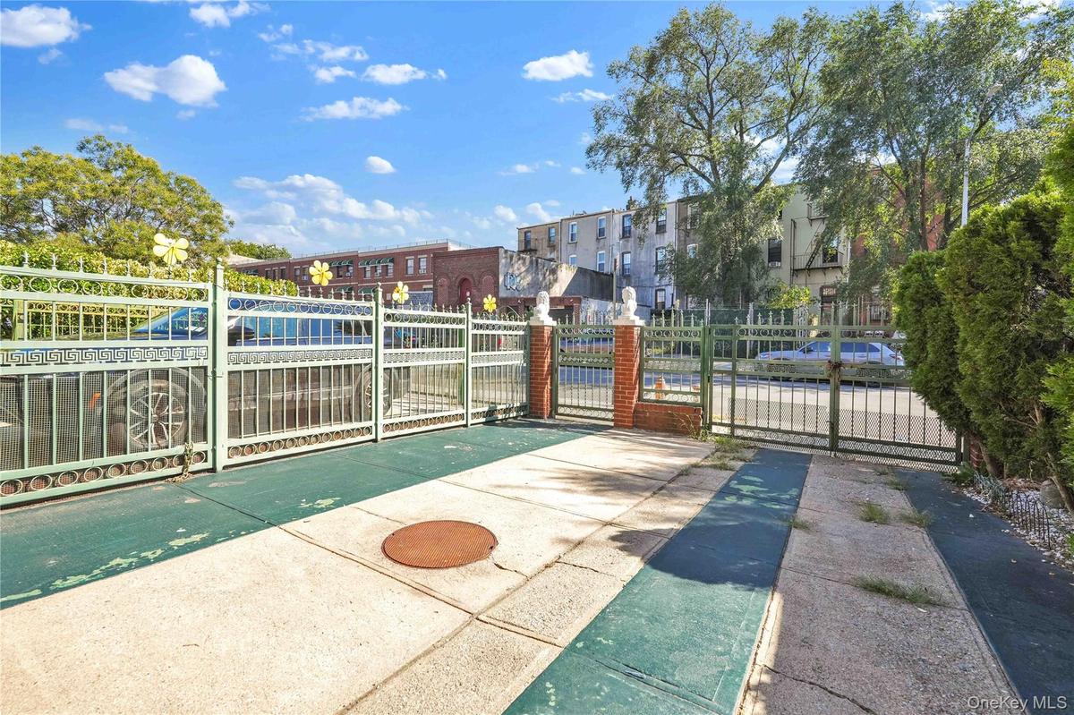 View of home's community featuring a gate