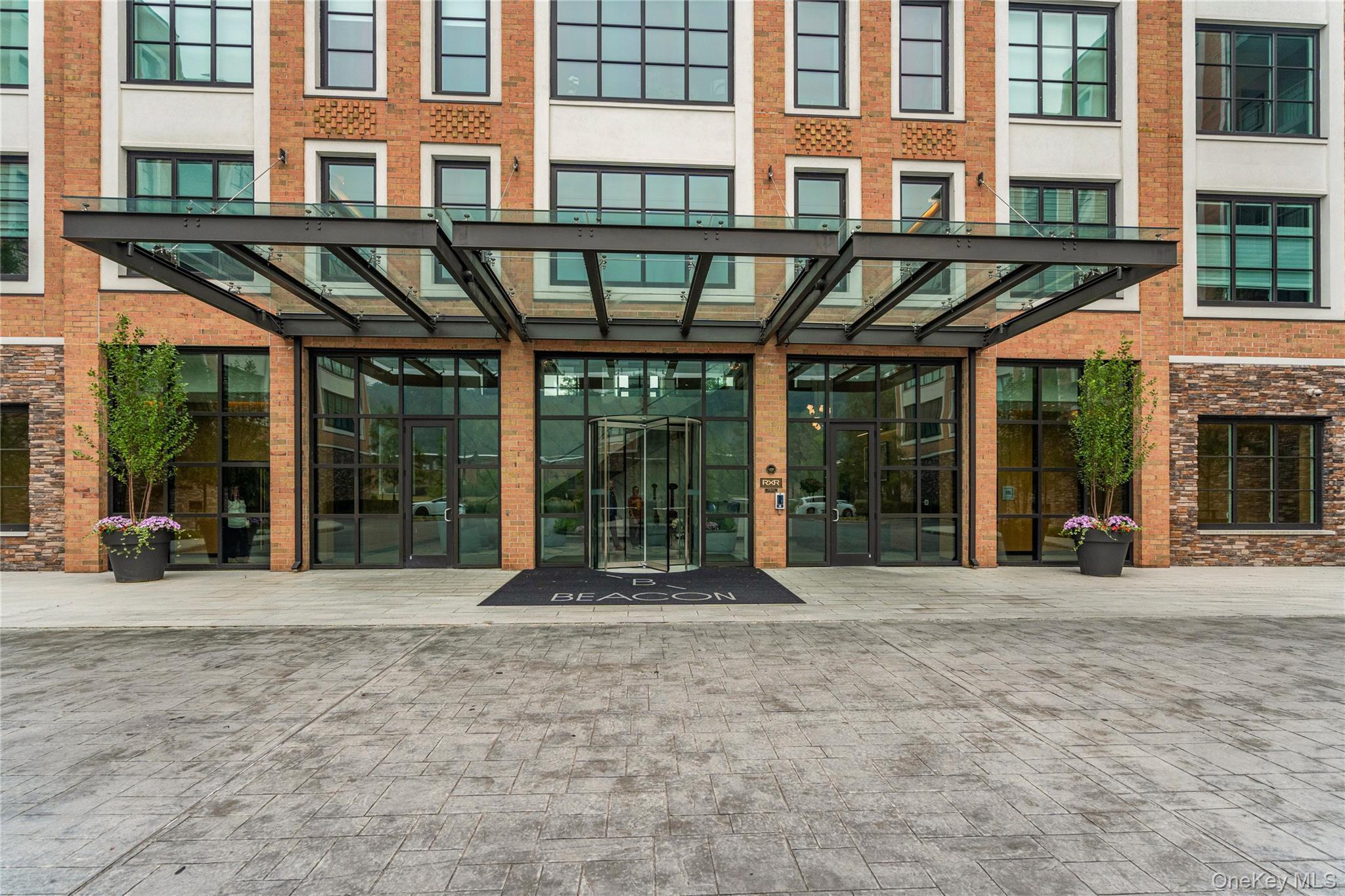 Property entrance with brick siding