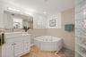 Primary Bedroom with sliding door to the pool