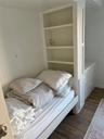 Bedroom featuring dark wood-style floors